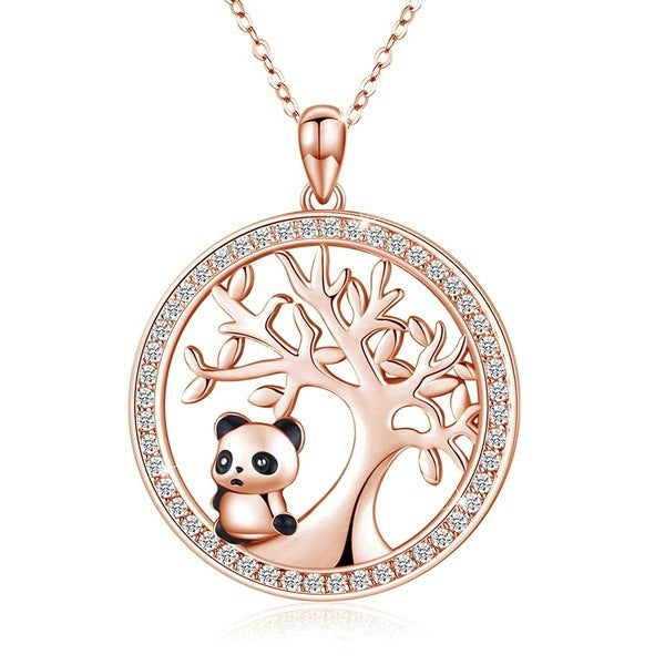 Rose gold necklace with panda and tree design on a white background