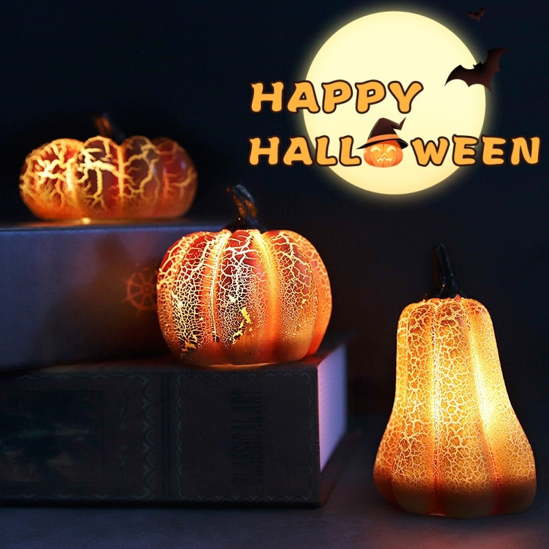Decorative pumpkins with glowing interior against a dark background with 'Happy Halloween' text.