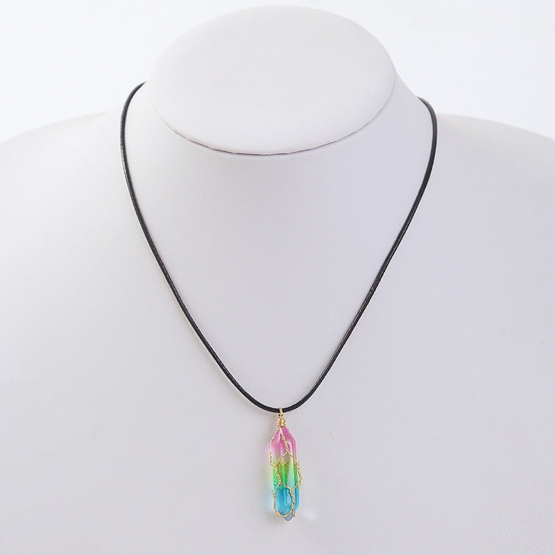 Necklace with a colorful pendant on a mannequin against a white background