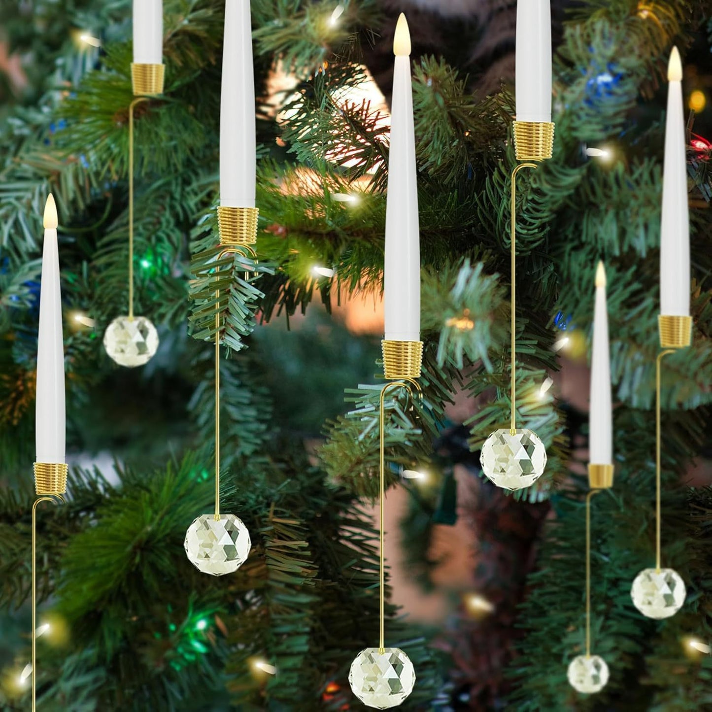 Decorative candles with crystal balls hanging on a Christmas tree.