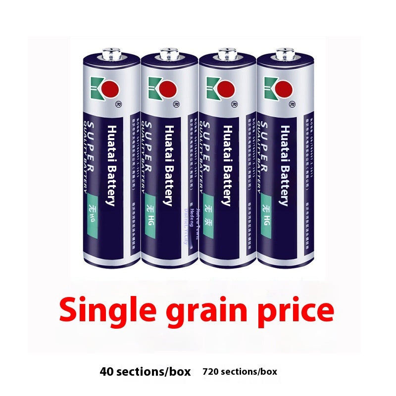 Black electric fireplace with flames and remote control, showing color-changing options on a blurred background.