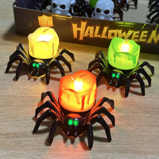Three spider-shaped lights with glowing eyes on a wooden surface, with 'Halloween' text in the background.