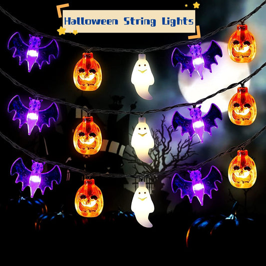 Halloween-themed string lights with pumpkins, ghosts, and bats on a dark background.